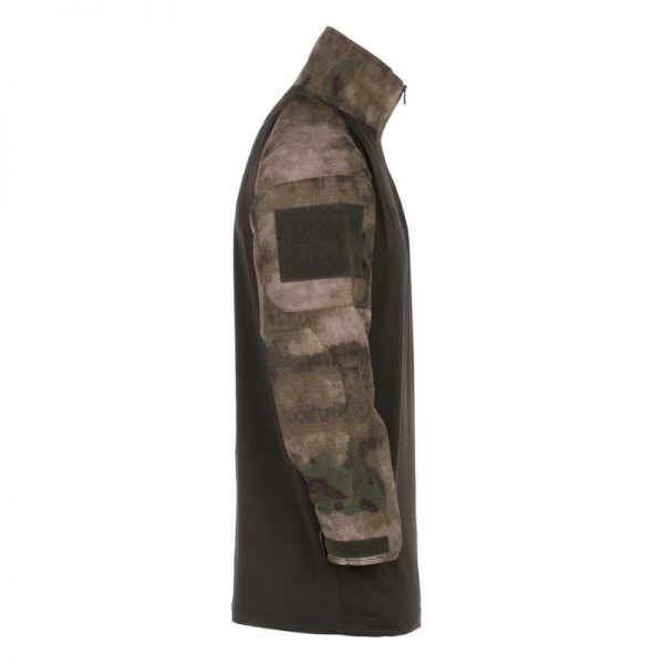 131400 Tactical shirt UBAC icc fg1 <big>Tactical shirt Belgisch Camo van 65% Polyester / 35% Katoen Ripstop en 100% Polyester.</big> <strong>Kenmerken:</strong> <ul> <li><big>Under Body Armour Combat Shirt, gemaakt voor het dragen onder het balistisch vest.</big></li> <li><big>Optimaal draag comfort, de armen zijn als een normale gevechtsjas opgemaakt van 50/50 NyCo Rip Stop en als extra voorzien van versterkte ellebogen.</big></li> <li><big>2 opgezette armzakken met Velcro vlakken en opbergzak met ritssluiting.</big></li> <li><big>Versterkte elleboogvlakken. </big></li> <li><big>Contour ontworpen polsen met Velcro sluiting.</big></li> </ul>