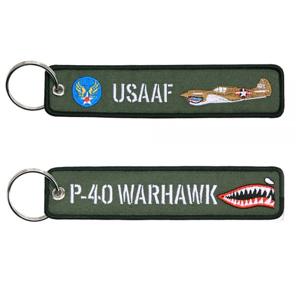 251305 1599 Sleutelhanger P 40 Warhawk 97 Sleutelhanger van 100% nylon <strong>Afmeting:</strong> 13 x 3 cm